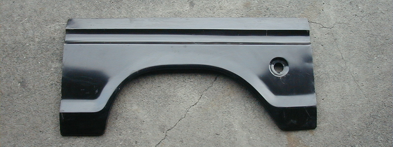 Ford Truck/Bronco BEDSIDE SKIN,WHEEL ARCH EXTENSION 73-79 LH (W/ROUND HOLE)(59"X28")